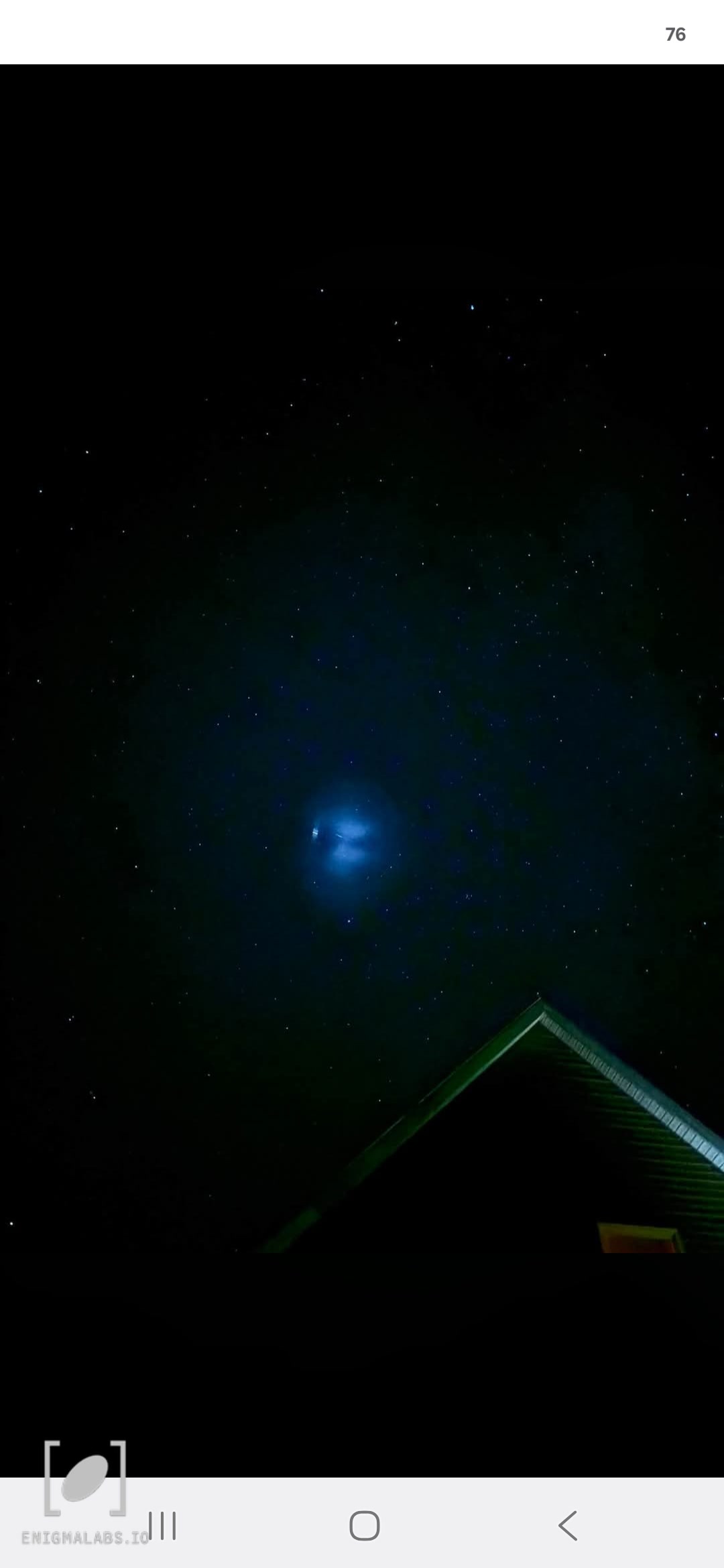 Crescent cloud with light in the sky